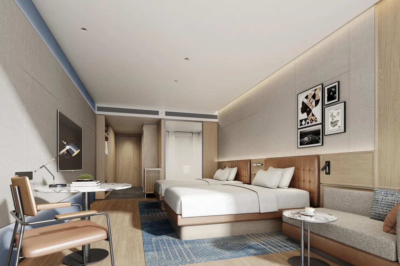 Design visualisation of a standard twin room with two beds, a desk and a sofa